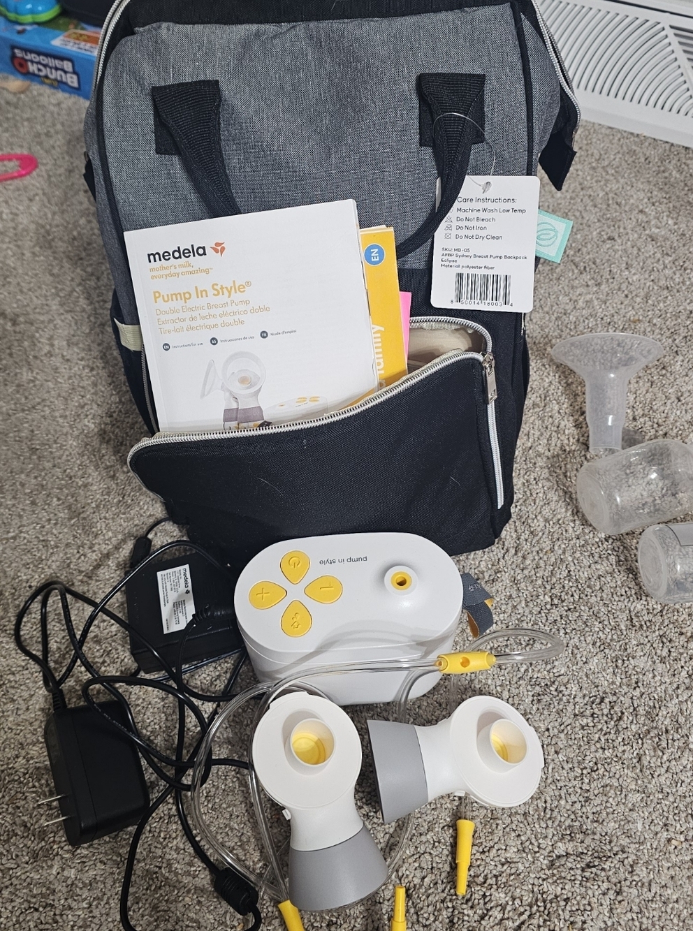 Medela Double Electric Breast Pump with Black/Gray Insulated Bag.